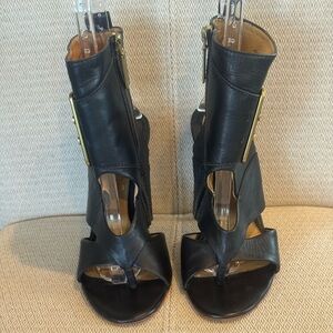 L.A.M.B. Black Leather Cutout High Heel Sandals with Gold Accent